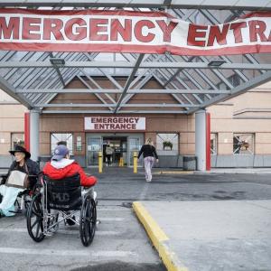 Alberta ER doctor challenges Premier Danielle Smith to come on shift, see patients wait in hallways