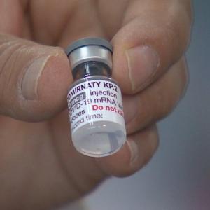 Alberta to cover COVID vaccines for health-care workers after all