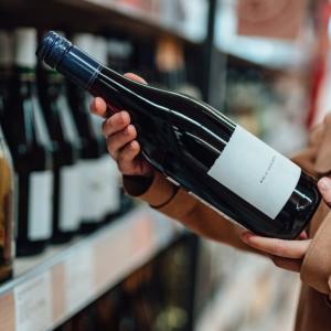 Cancer warning labels on alcohol may motivate people to drink less, study says