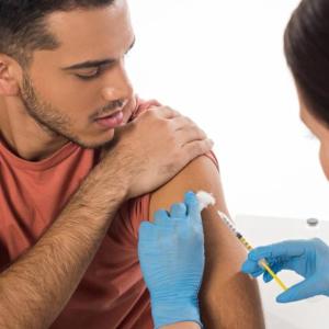 HPV vaccination cuts cancer risk in men by about half, study suggests