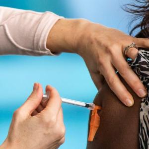 Think you're not eligible for a free COVID shot in Alberta? Double check, experts urge