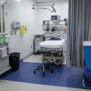 What does healthcare coverage for newcomers actually cost Alberta?