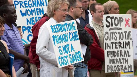 Experts fear new health care fees will push refugees out of care