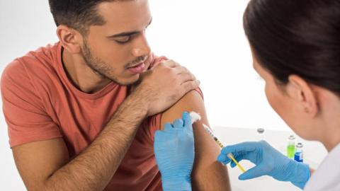 HPV vaccination cuts cancer risk in men by about half, study suggests