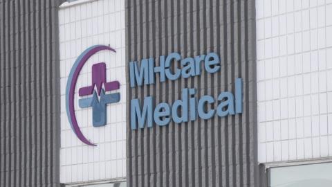 Judge's report on health procurement scandal finds official had conflict of interest