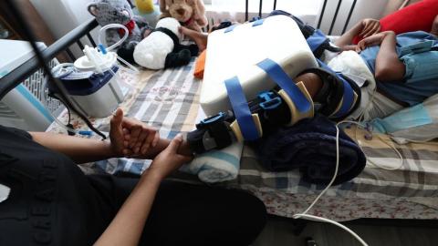 The Carney government cut health-care funding for refugees. Here's what that looks like to Olivia