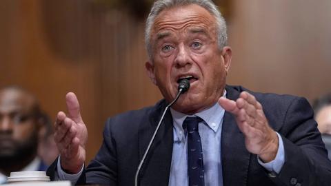 Trump gets a COVID shot as access to them tightens for most Americans